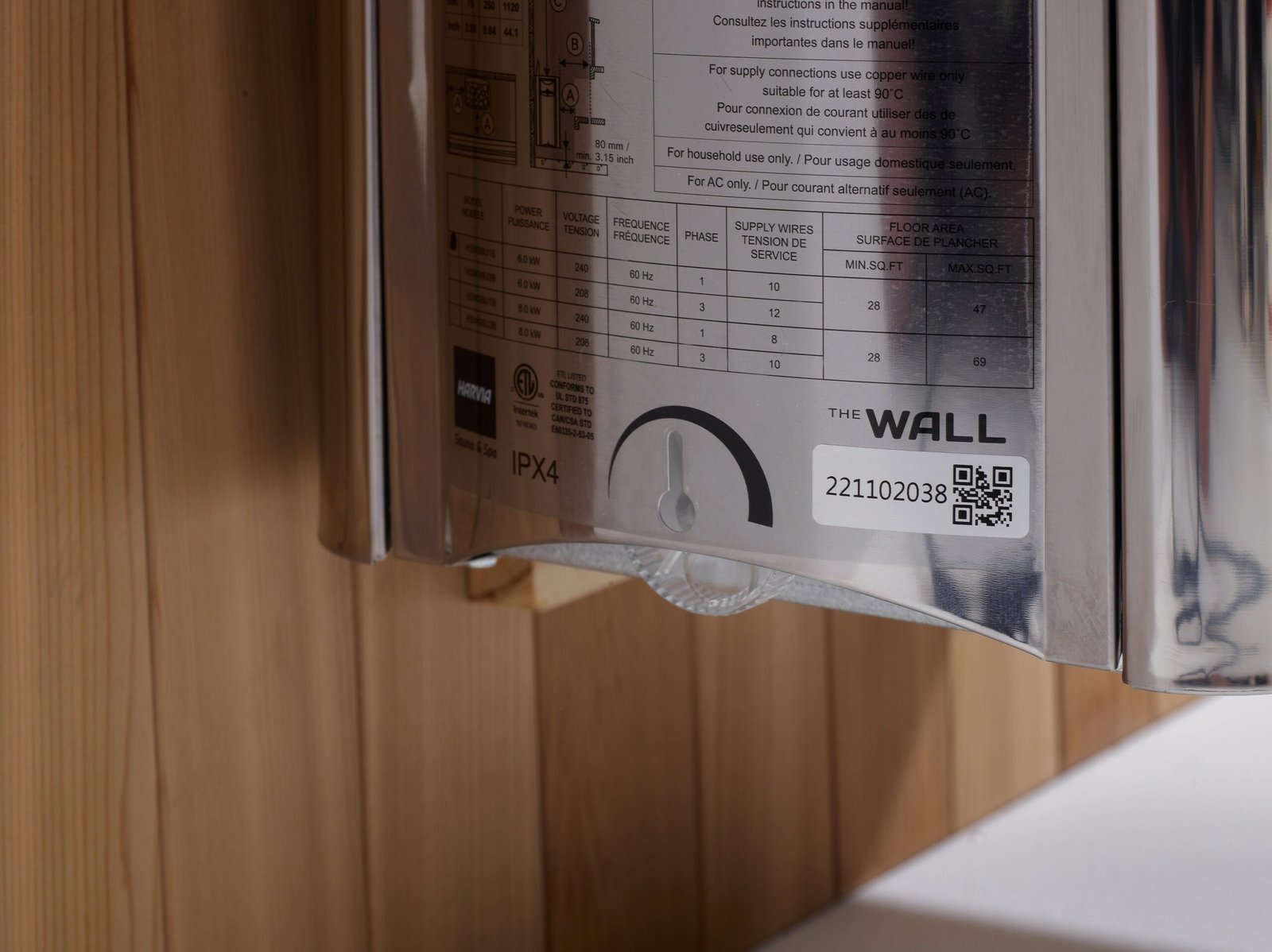 Harvia Wall sauna heater rating label close-up with model details and electrical specifications.