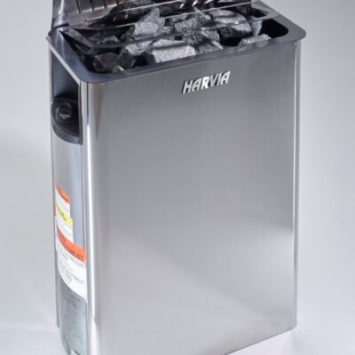 Harvia sauna stove mounted on wall with heated stones and protective wooden surround.