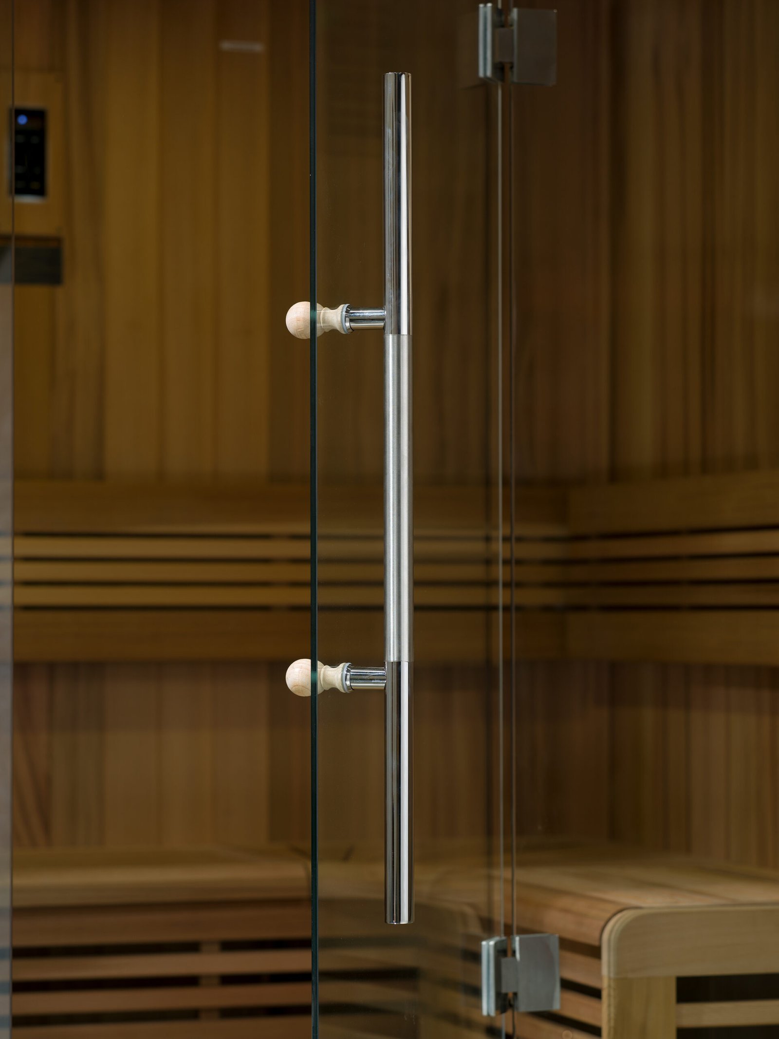 Tempered glass door with stainless steel handle on 2 person traditional sauna