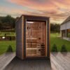 Golden Designs Narvik 2 person outdoor traditional sauna in landscaped backyard setting