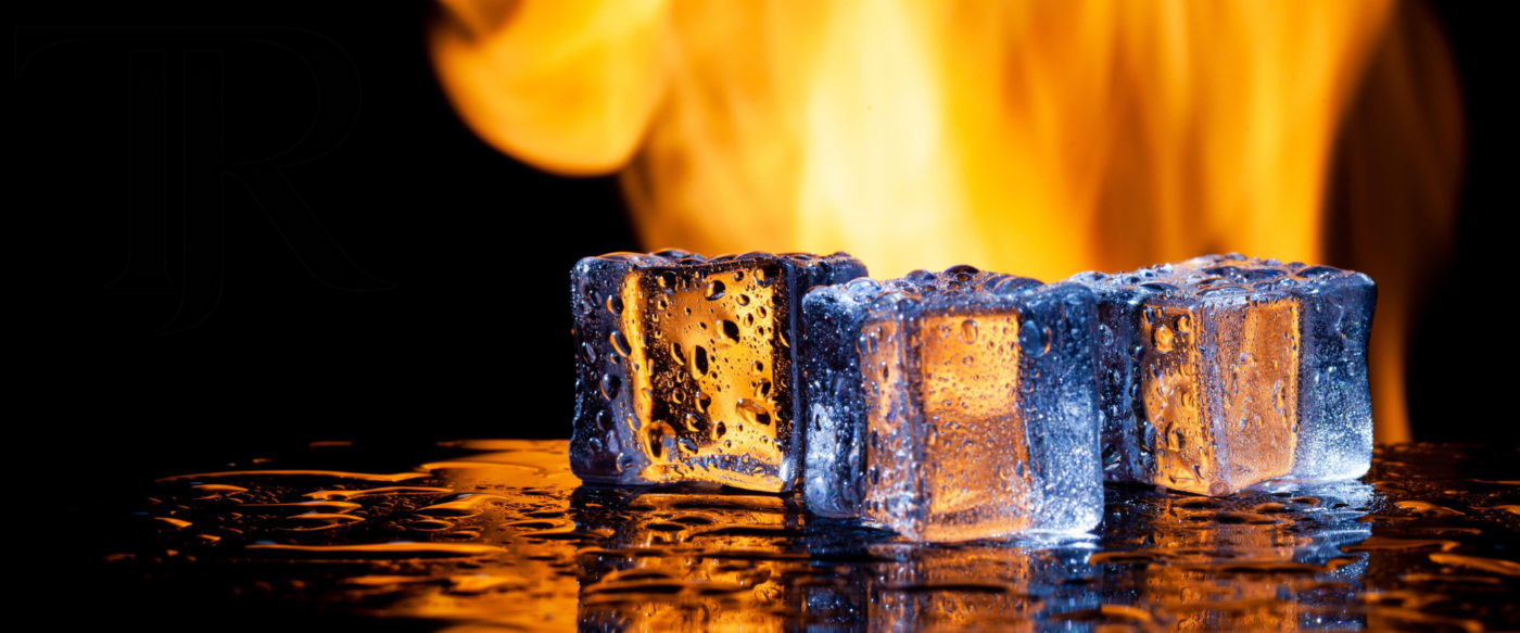 Fire and Ice Treatment image showing melting ice cubes glowing against bright flames, highlighting intense heat and cold contrast.